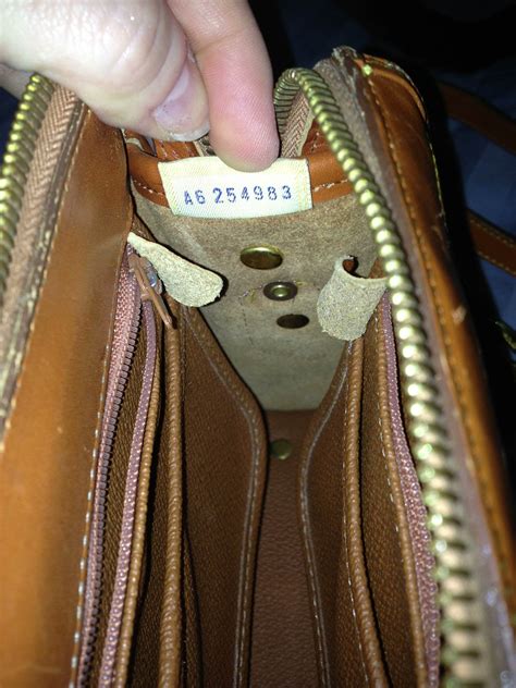 how do you spot a fake dooney and bourke bag|dooney and bourke bag identification.